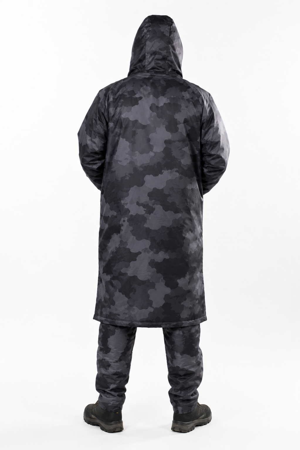 A person shown from the back wearing a long hooded Stay Dry fishing and outdoor coat and matching pants in a dark gray and black camouflage pattern, standing against a plain white studio background.